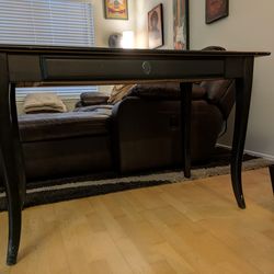 Stylish black wood desk