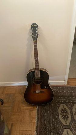Used guitar and stand