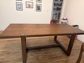 Dining table in wood finish