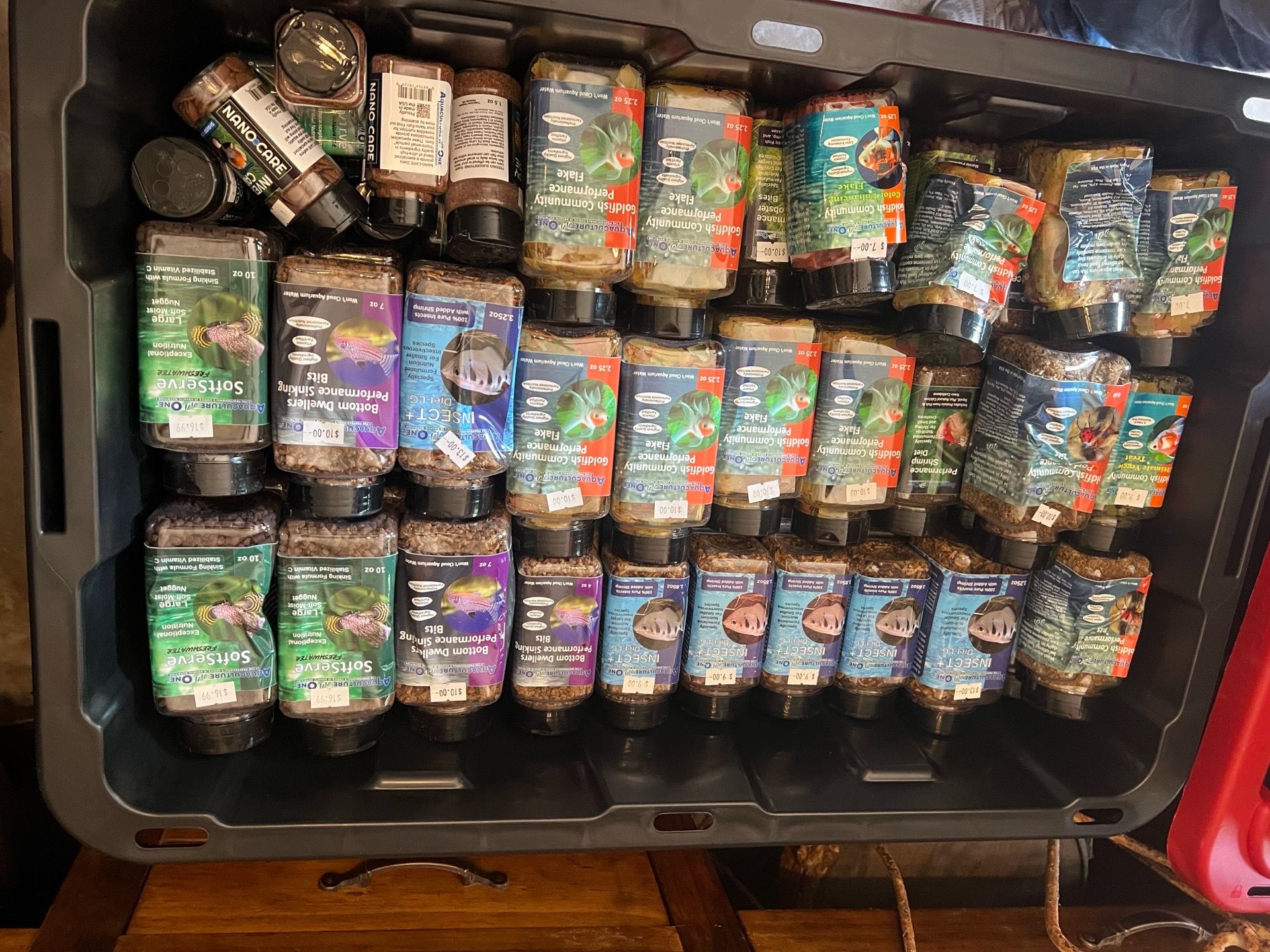 Tote packed tight full of assorted fish food