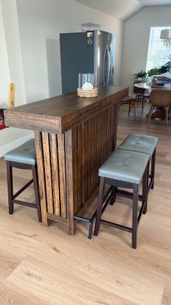 Dark wood colored 63” bar table