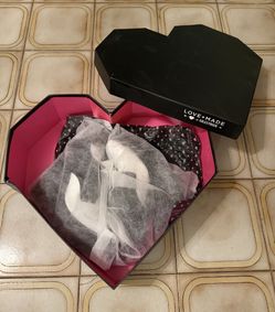 Shoes In Heart Shaped Box
