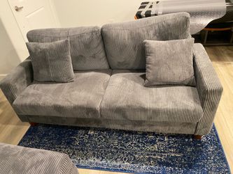 Gray love seat with storage ottoman