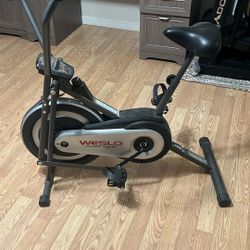 Weslo Cross Cycle Upright Exercise Bike with Inertia-Enhanced Flywheel,