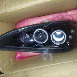 05 Pontiac Grand Am Headlights 