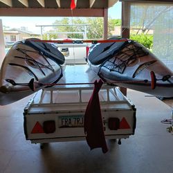 His and Hers Identical 12 ft. Sit-Inside Kayaks For Sale