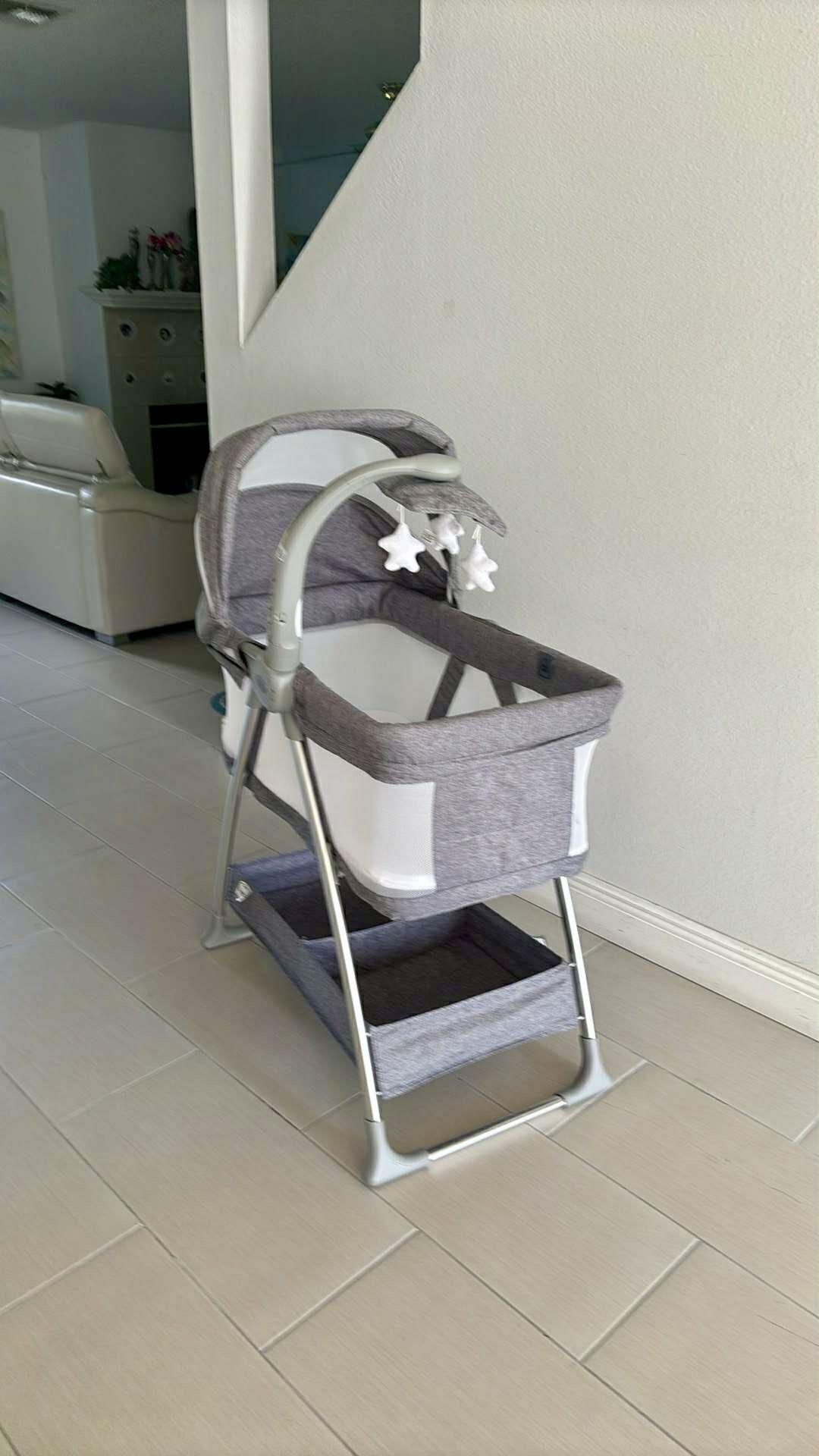 Bedside Bassinet Portable Crib With Activity Mobile, Arm With Nightlight, Rotating Stars Size 33”Lx 46”Hx 20” W Color Grey Tweed Like New