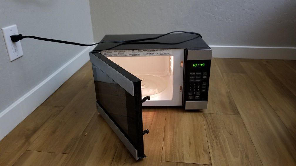 GE Microwave (sleek black and Gray color)