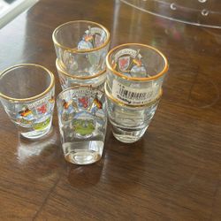 Decorated shot glasses with gold rim