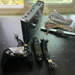 Nintendo Wii system with gamecube and wii games and extras