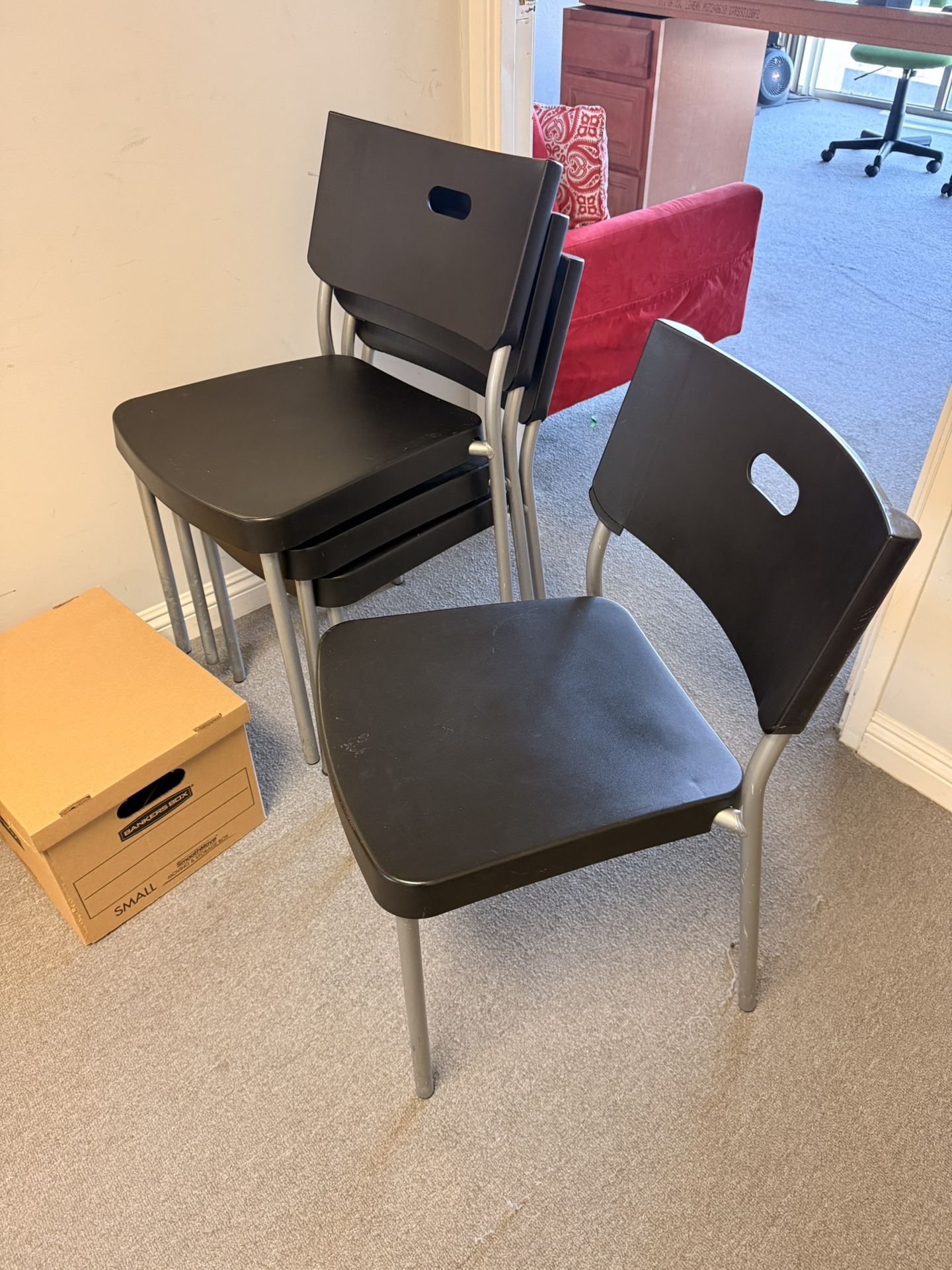 4 Black IKEA Plastic Chairs
