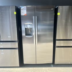 GE - Side By Side Refrigerator In Stainless Steel