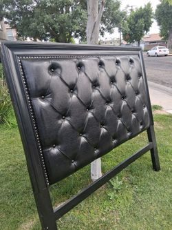 Black faux leather queen headboard