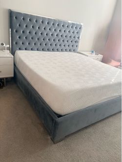 Kings sized gray velvet tuffed bed frame and mattress