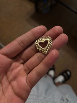 Gold rolex pendant