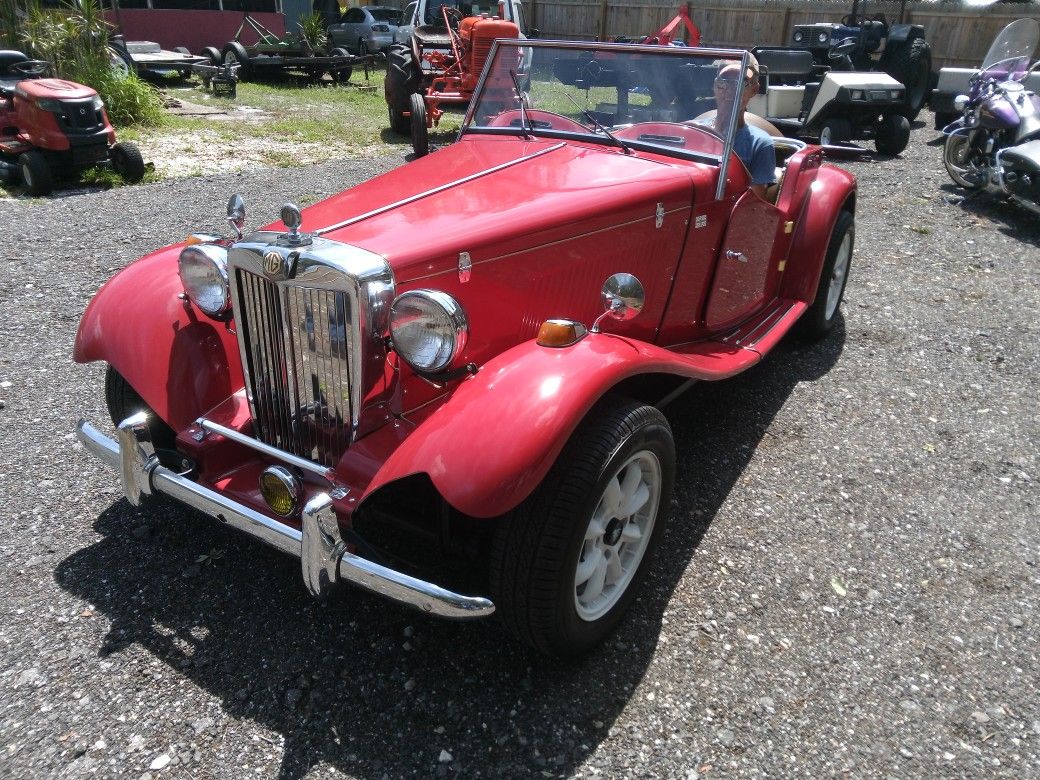 Three Antique Cars For Sale