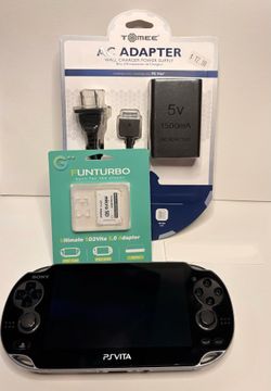 Ps Vita 1000 - w/ charger and sd card to vita card