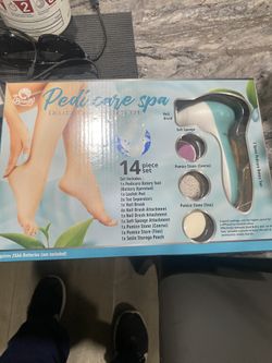  "Pedi care spa" deluxe pedicure system. It is a 14-piece set designed for at-home foot care.
