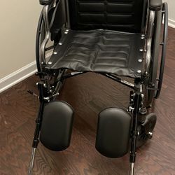 Folding Wheelchair With Elevating Leg Rests