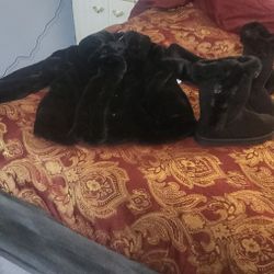 Woman's coat and woman's boot set.