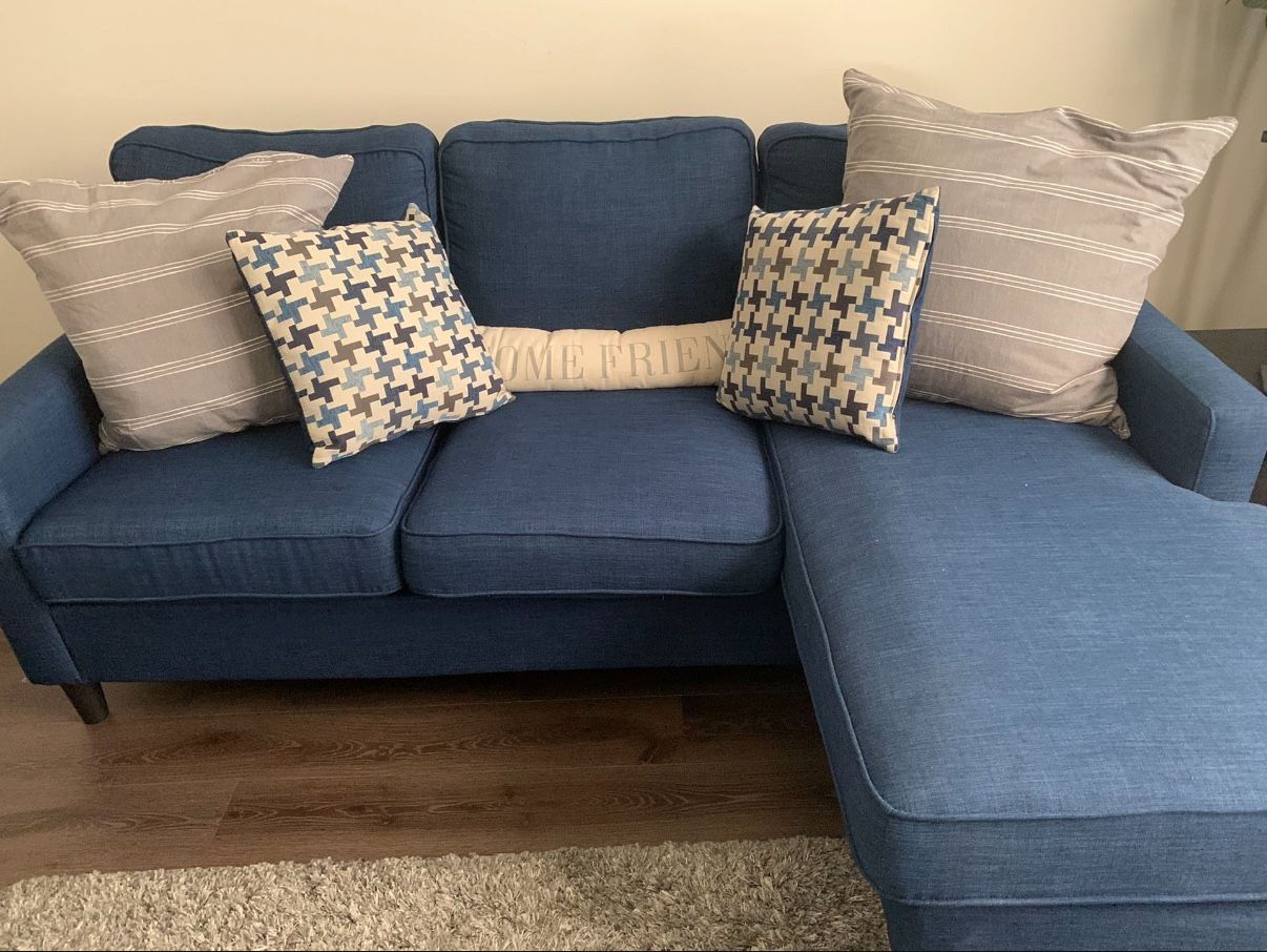Navy blue couch with moveable chase