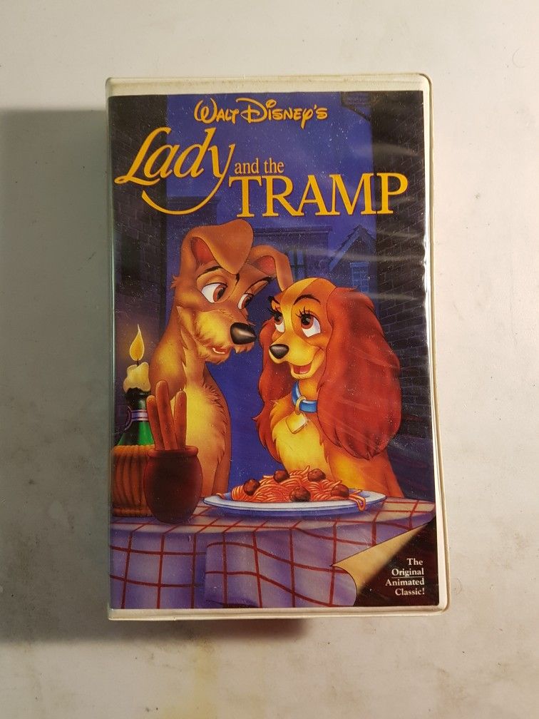 Walt Disneys Lady and the Tramp VHS Movie with Clamp Shell Red Signature Used