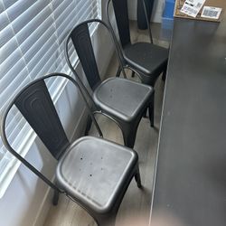 3 metal indoor/outdoor dining chairs 