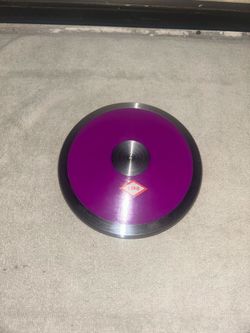 Throwing discus, official track and field for high school or college Throwing disc official track and field for high school or college