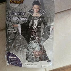 Holloween  Costumes ,,still In Packets And Dress 