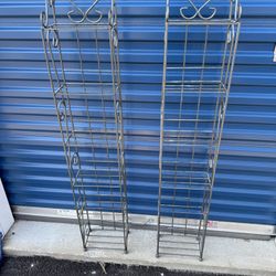 Two Metal CD/ DVD Stands  9” wide  5 1/2” deep  50” tall 