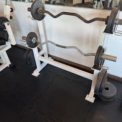 Curl bars with weights and rack