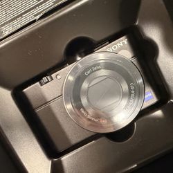 BRAND NEW Sony Cybershot DSC-RX100 Carl Zeiss Digital Camera for $1000