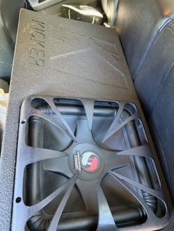 Kicker L7 12 in a sealed kicker box with a 1200 watt xenon amp Hits super hard