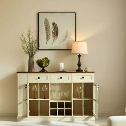 GeneralSTUNNING SIDEBOARD IN OFF WHITE COLOR AND WOOD TOP.TEMPERED GLASS 58X17X36 BRAND NEW.GREAT SHAPE