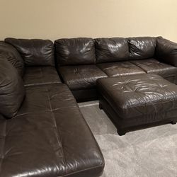 Brown Leather Couch With Chase And Ottoman
