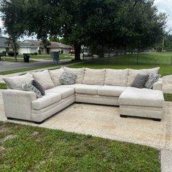 Large Beige Sectional Sofa with Reversible Chaise