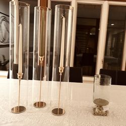 Glass hurricanes & Gold Candle holders 