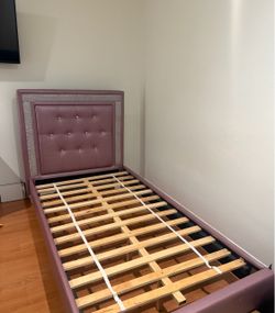 2 Twin-Size Pink Bed Frames