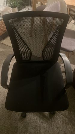 Black mesh office chair with armrests