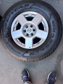 Nissan 6 Lug Rim And Tire 265/70/r16