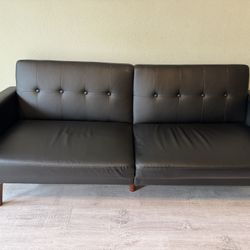 Futon. Black Faux Leather