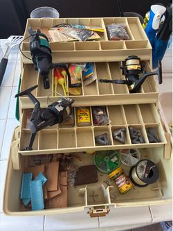 Plano fishing tackle box full of gear ! Three reels !!!!