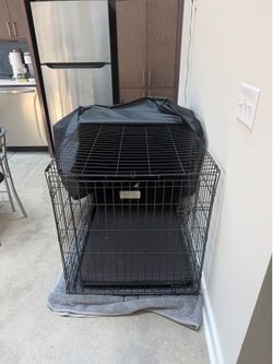 Selling an extra-large heavy-duty wire dog crate in excellent condition.