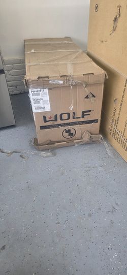 Wolf 48"Wall Mount Canopy Range Hood with Infinite-Speed Blower Control, Automatic Heat Sentry, Baffle Filters, 24 Inch Depth and Recessed Easy-Access