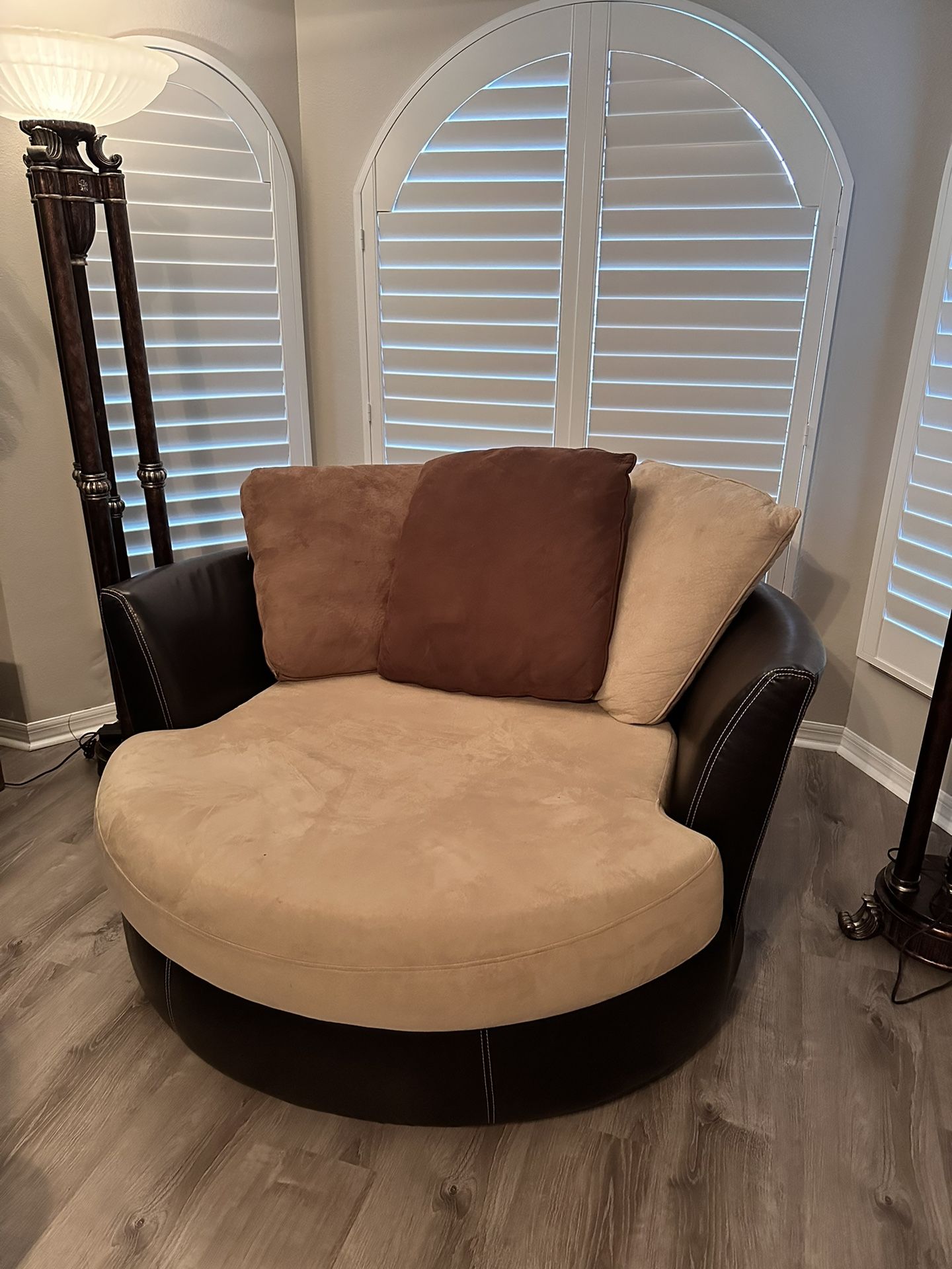 Black And Tan Swivel Accent Chair From Rooms To Go