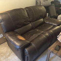 Leather reclining loveseat