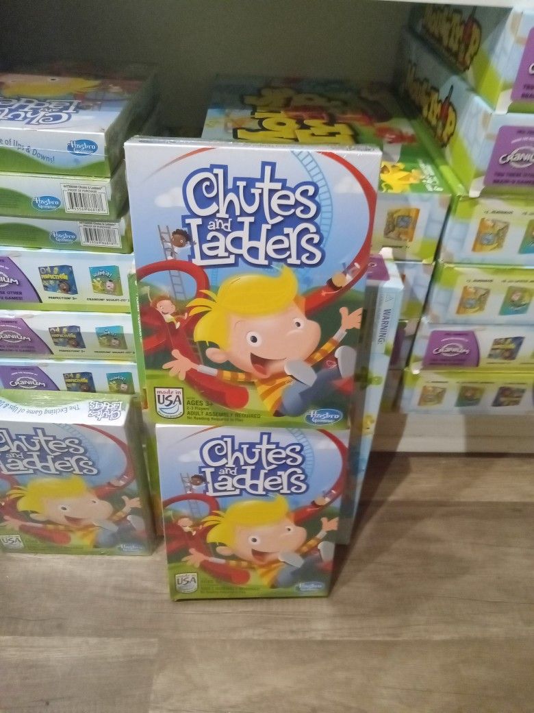 CHUTES AND LADDERS  AGES 3 + 