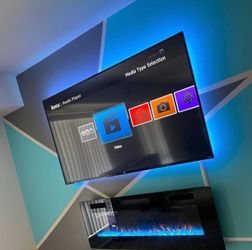 TV WALL MOUNT ON THE WALL