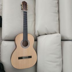 6 string acoustic guitar with case included