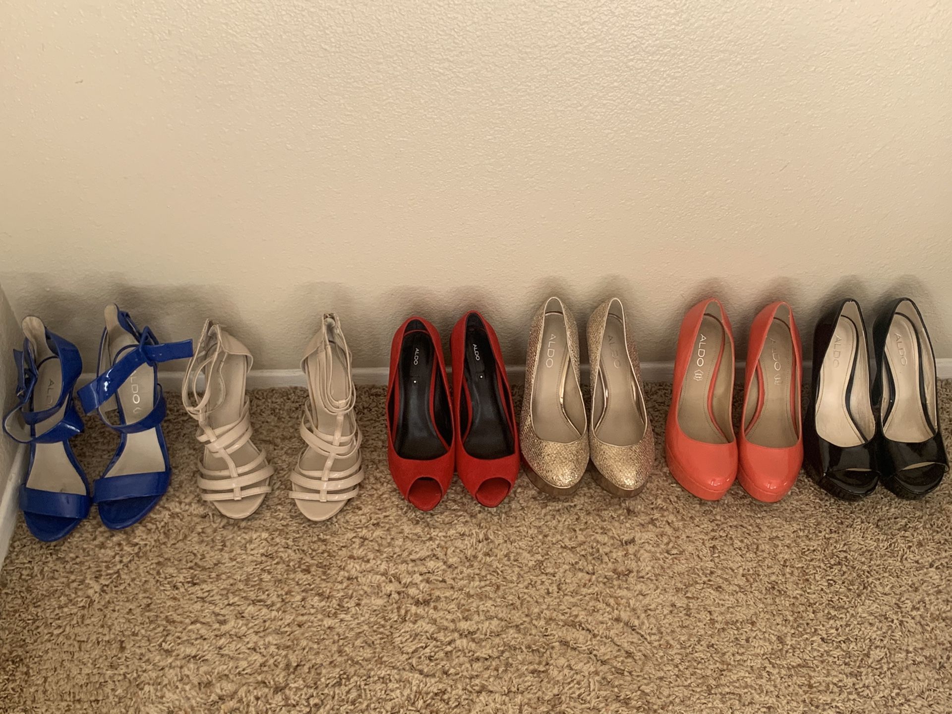 12 brand name pair of womans heels 6.5/7